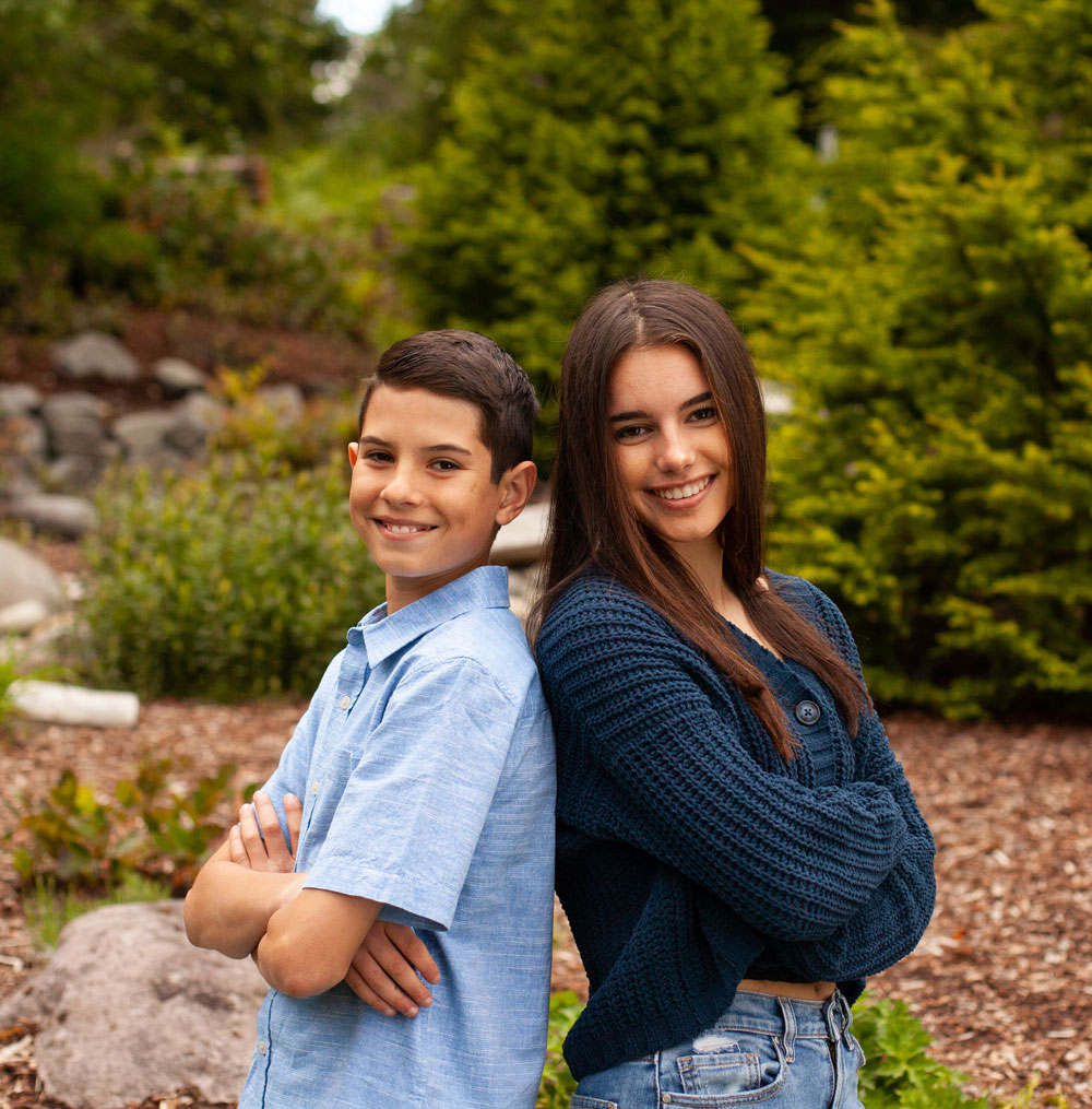 brother and sister-back-to-back