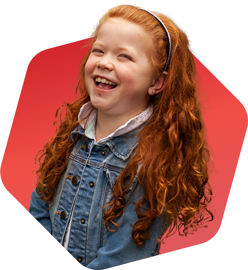 little red headed girl smiling
